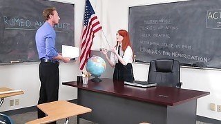 Redhead babe is giving her teacher a deep blowjob